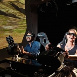 people having fun in projection dome at iaapa 2013 in orlando