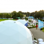 two geodesic domes by freedomes for world amateur golfers championship in binowo